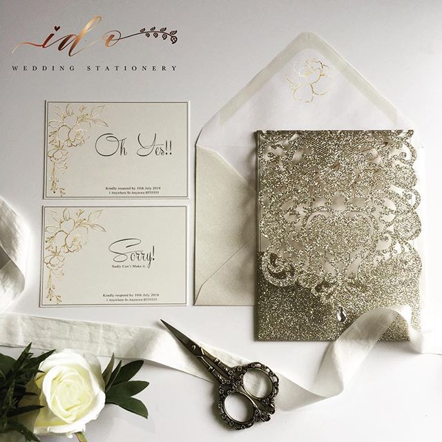 Champagne gold laser cut folder, with gold foil floral details printed ...